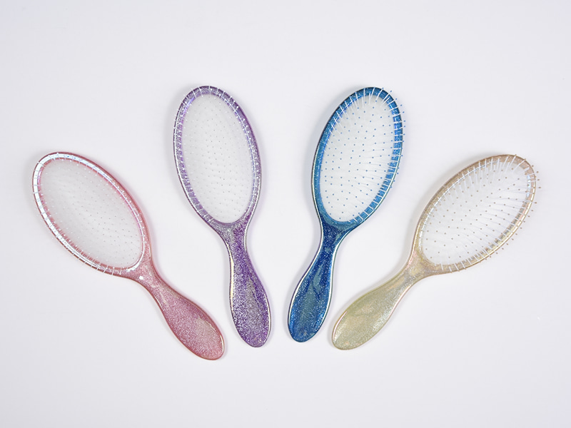 濡れた髪のもつれをほぐすヒートプリントヘアブラシ