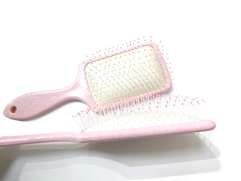 ピンクのもつれ解消パドル ヘア ブラシ